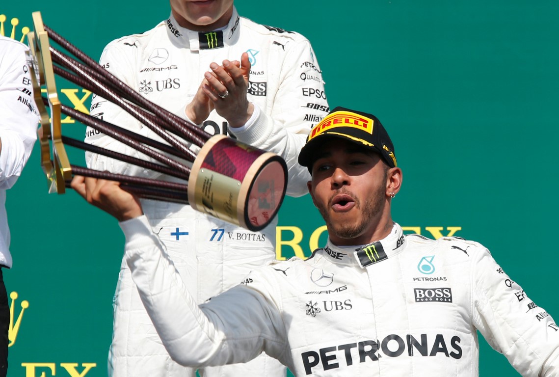 Lewis Hamilton celebrates his victory in the Canadian Grand Prix. Photo Reuters
