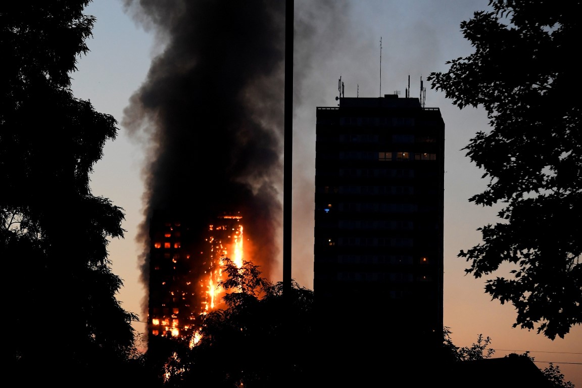 Flames and smoke billow from the tower block at Latimer Road in West London. Photo Reuters