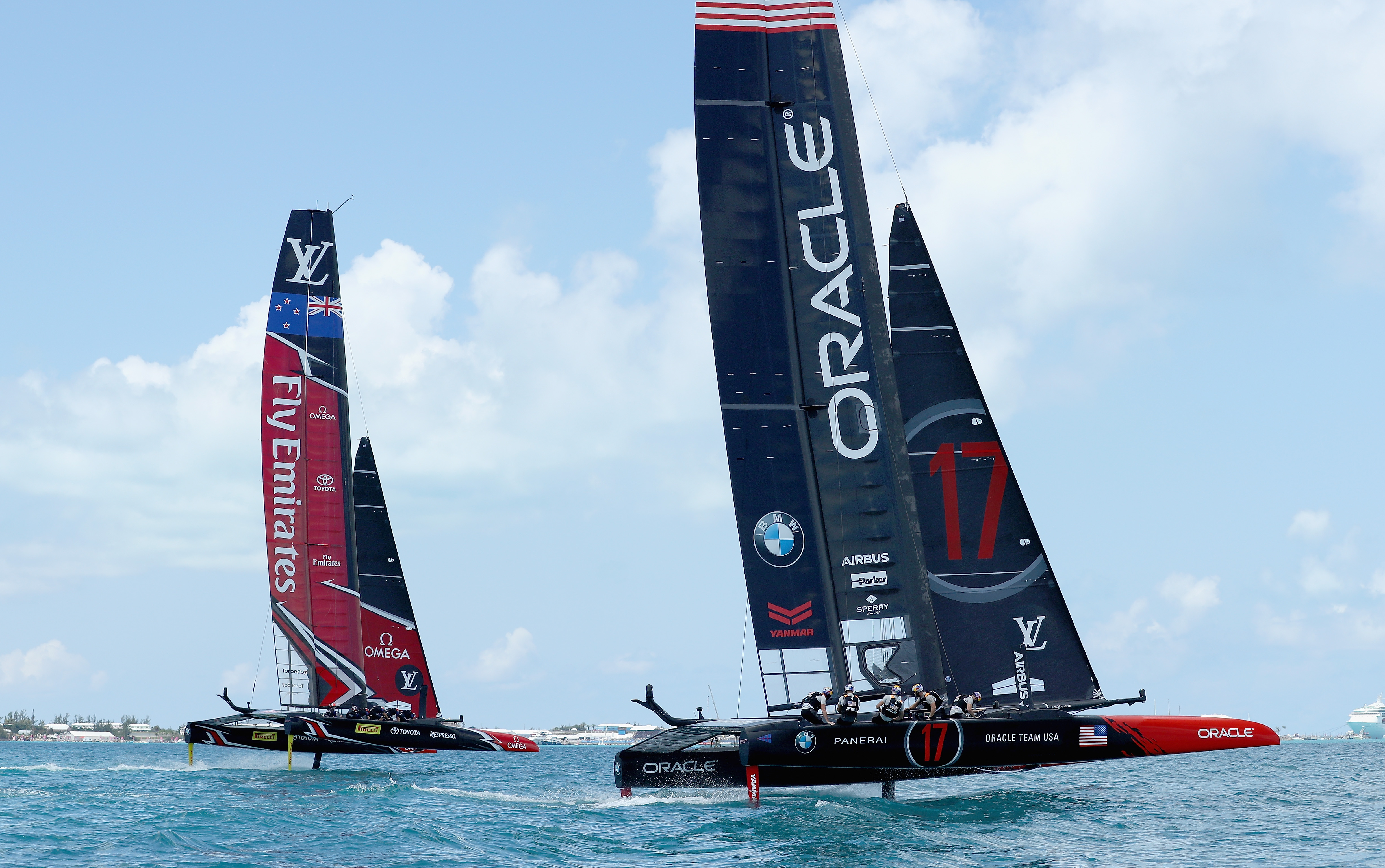 Oracle Team USA skippered by Jimmy Spithill in action racing against Emirates Team New Zealand...