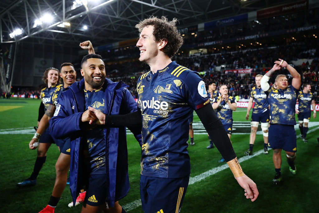 Highlanders Marty Banks (R) and Lima Sopoaga celebrate their team's win over the British and...