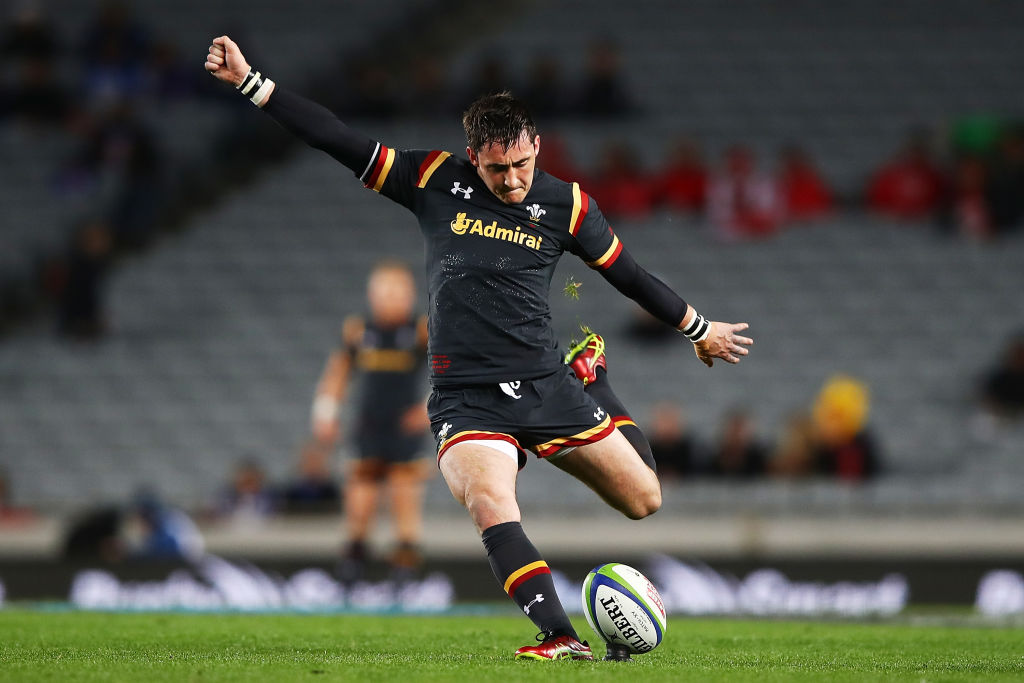 Sam Davies takes a shot at goal for Wales against Tonga. Photo Getty