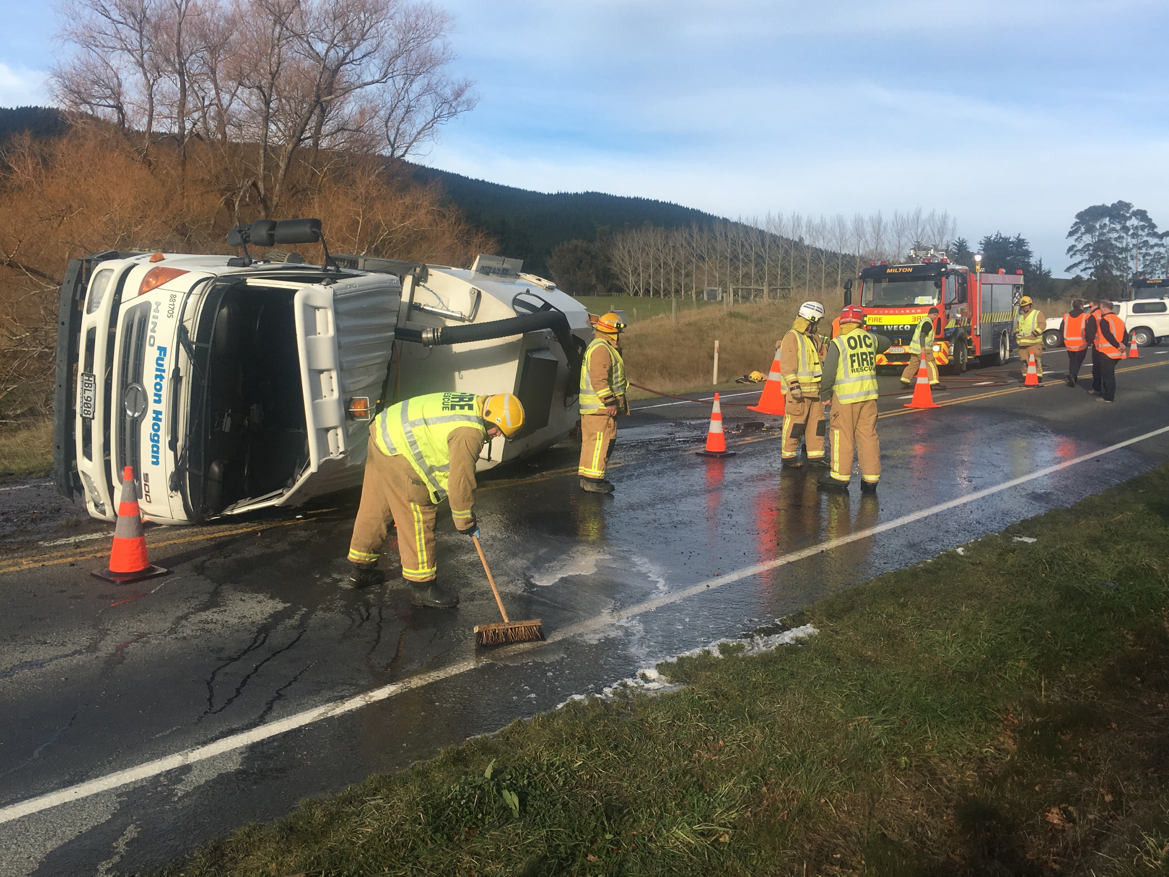 The driver of this truck suffered moderate injuries when it rolled this morning. Photo: Craig Baxter