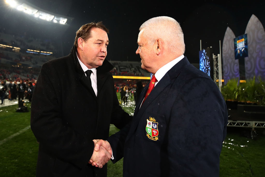 All Black coach Steve Hansen (L) shakes hands with Lions coach Warren Gatland after the match....