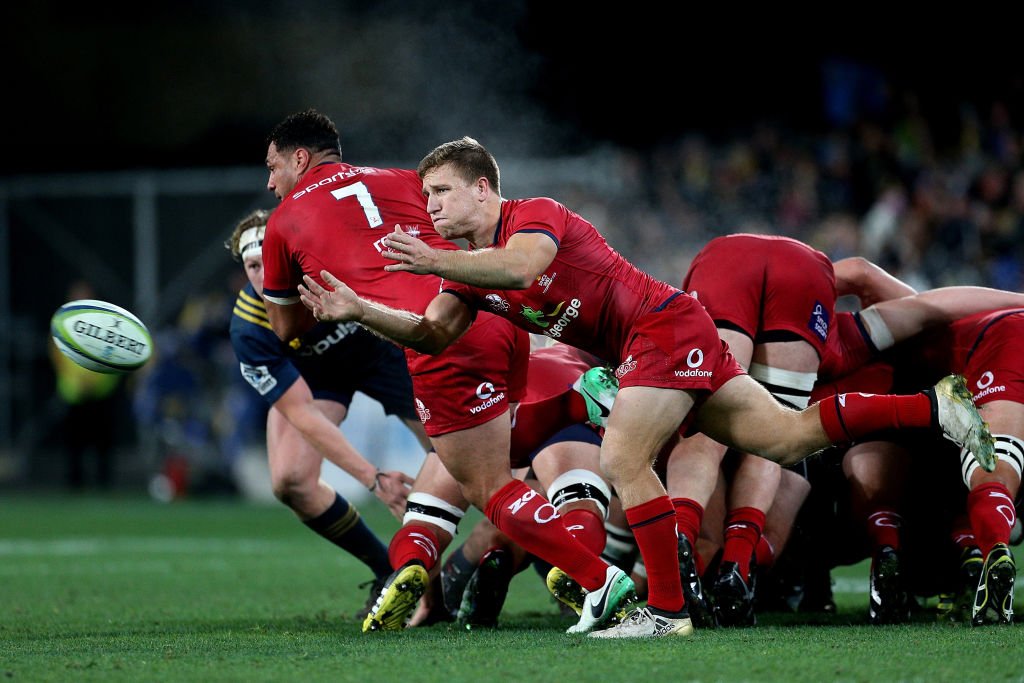 James Tuttle of the Reds gets the ball away. Photo: Getty