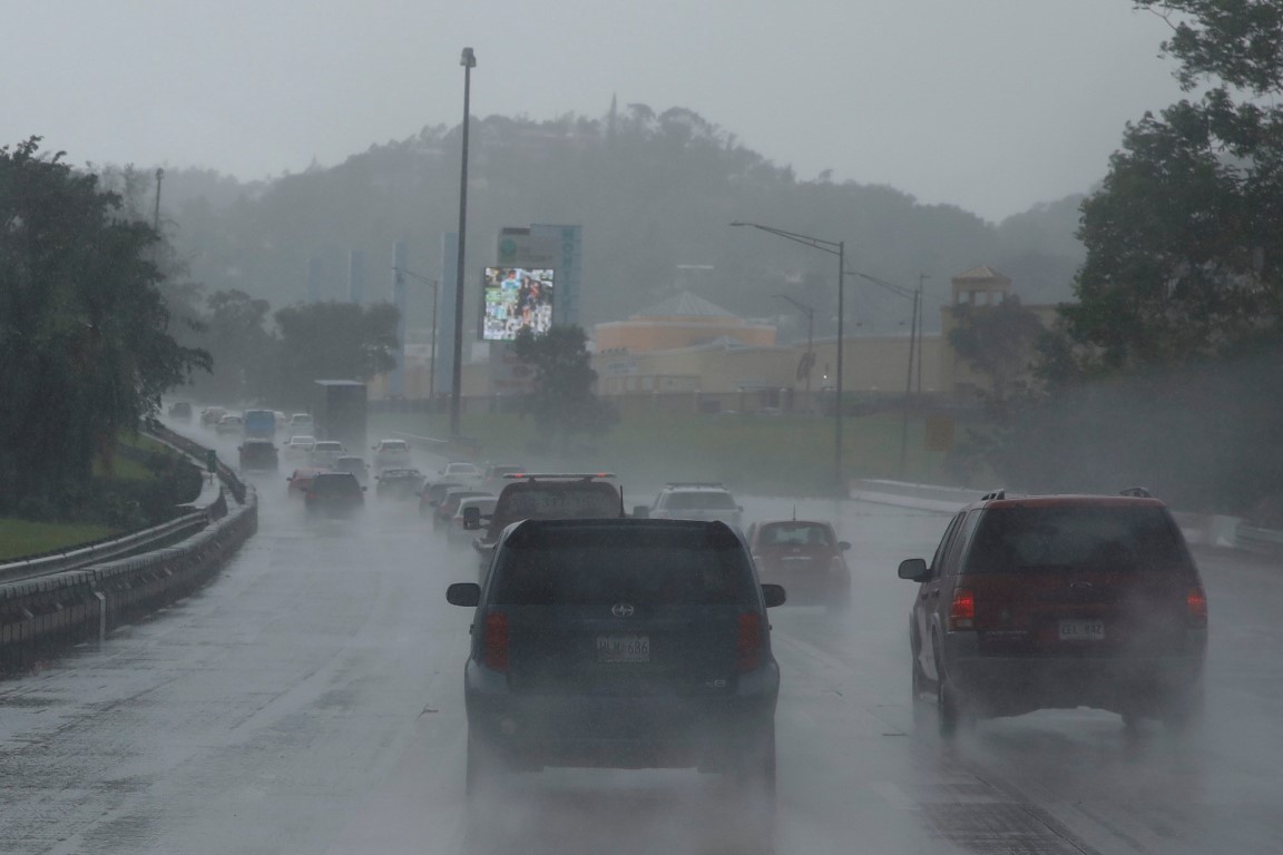 Cars on a highway during rain before the arrival of the Hurricane Maria in San Juan, Puerto Rico....