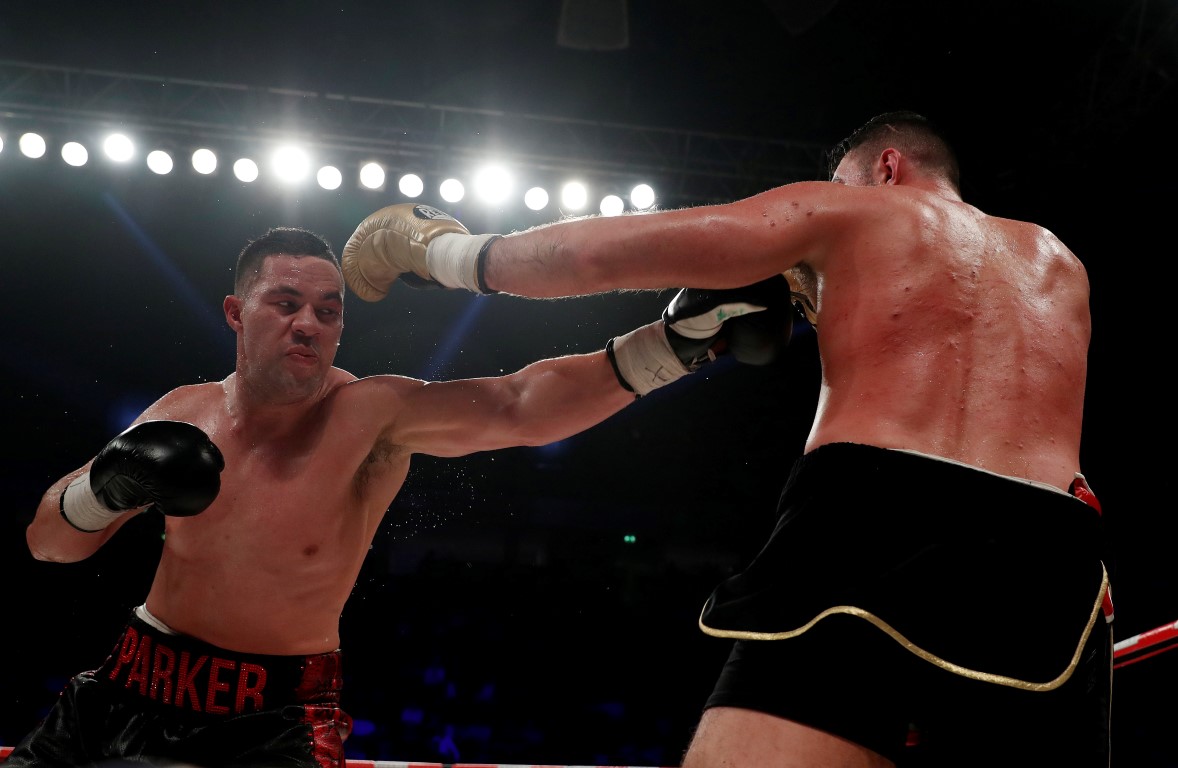 Joseph Parker (L) throws a left at Hughie Fury during their bout. Photo Reuters