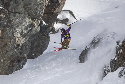 Down he goes . . . Wanaka freeride skier Hank Bilous finds a way down the course during The North...