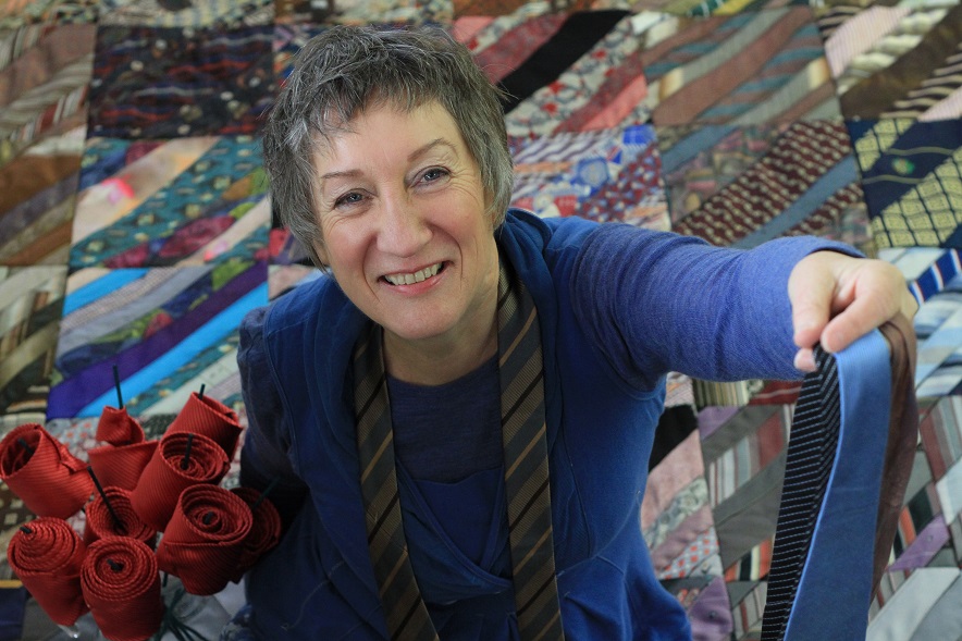 Oamaru's Irene Sparks with some of her collection of more than 21,000 ties. Photo: Hamish MacLean