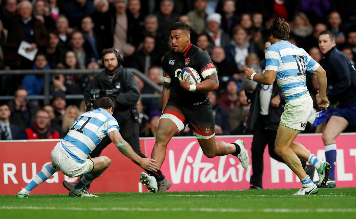 England’s Nathan Hughes runs in to score their first try against Argentina. Photo Reuters