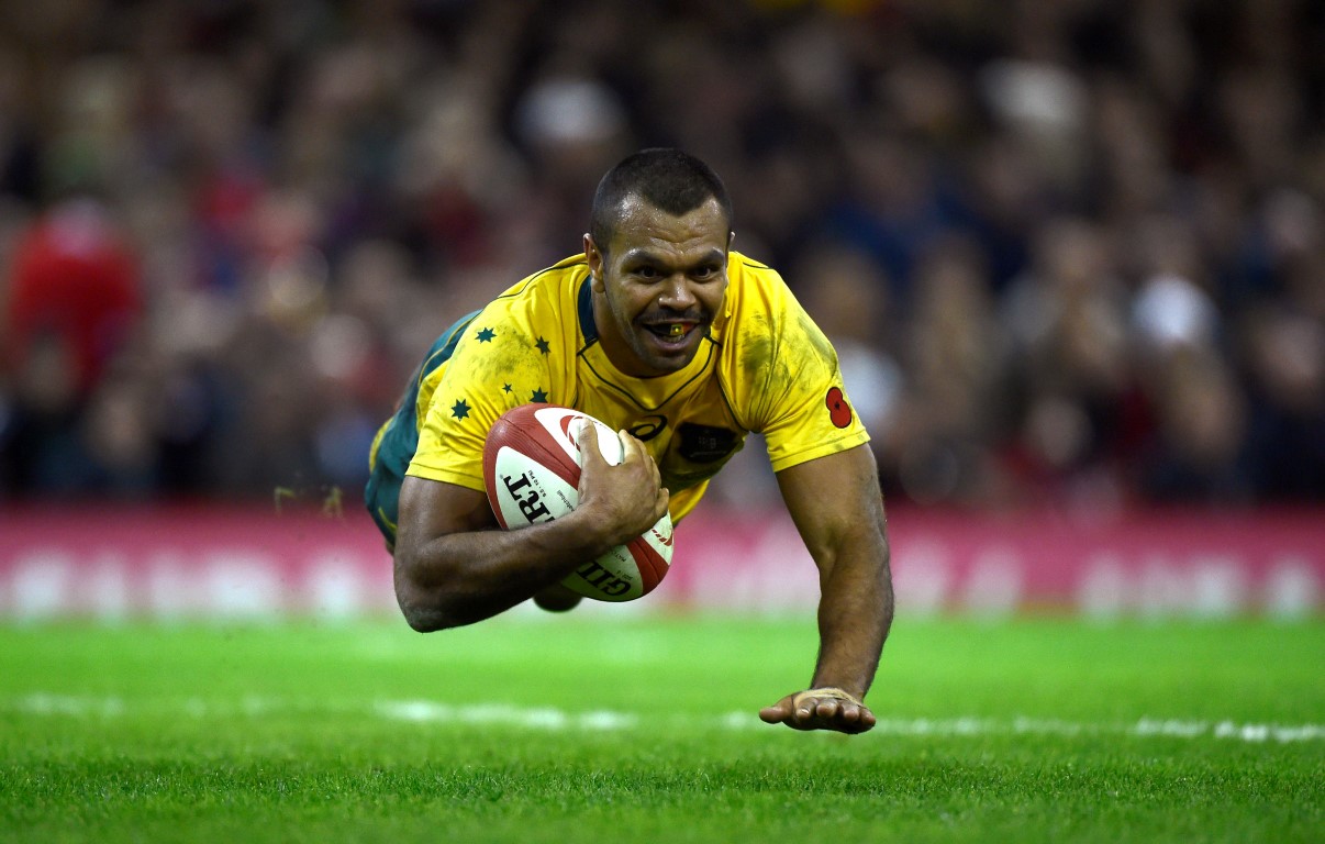 Kurtley Beale dives over to score for Australia. Photo Reuters