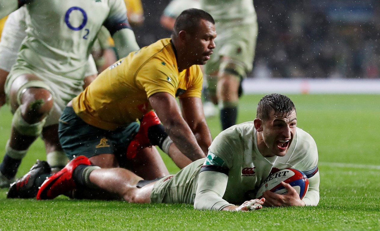 Jonny May crosses to score a try for England against Australia. Photo: Reuters