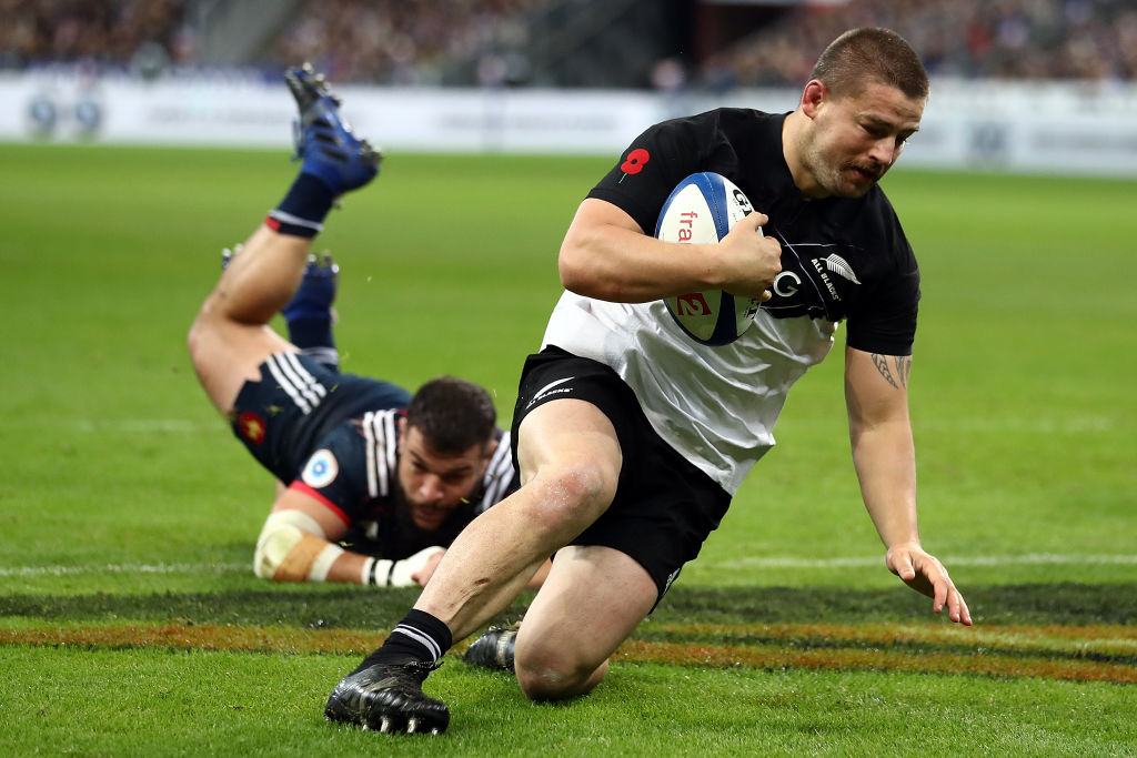 Dane Coles runs in to score the opening try for the All Blacks. Photo: Getty