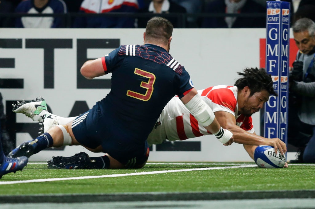 Shota Horie scores in the corner for Japan against France. Photo: Getty Images