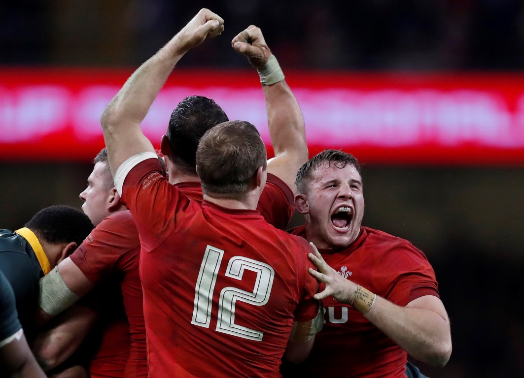 Welsh players celebrate their win over South Africa. Photo: Reuters