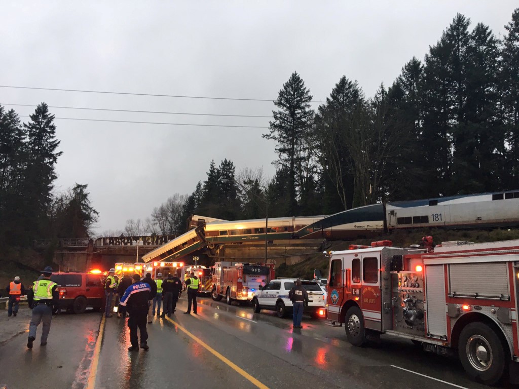 First responders at the scene of the derailment. Photo: Reuters