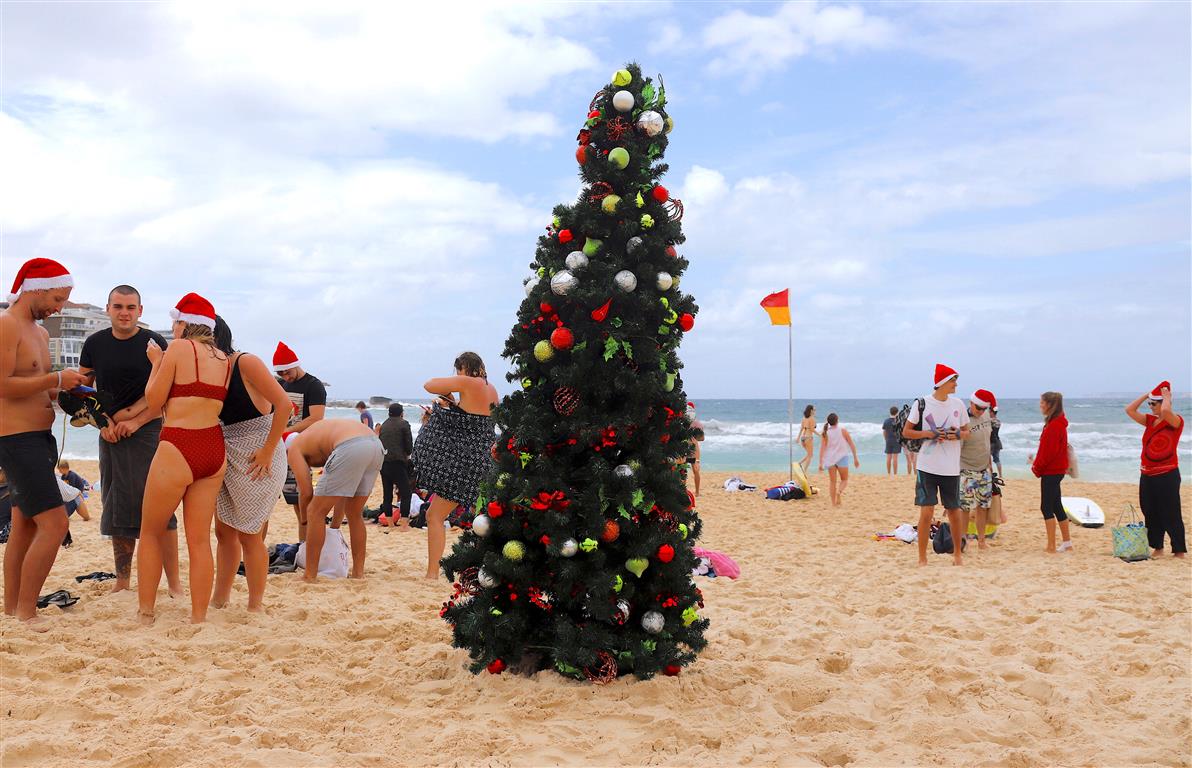 People celebrate Christmas Day on Sydney's Bondi Beach. Photo: Reuters