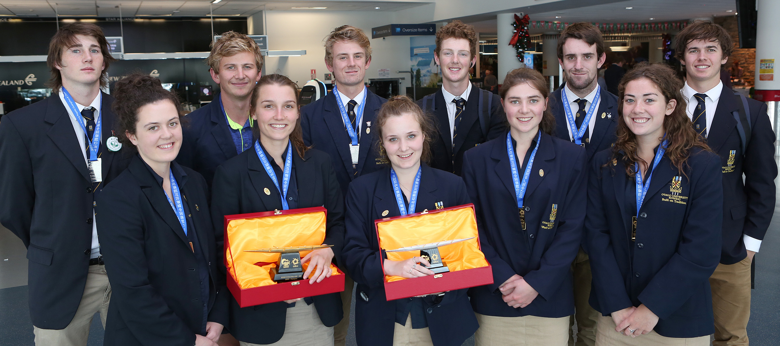 University of Otago rowers (back row from left) Aaron Roydhouse, James Haig, Corey Lewis, Kyle Hughes, Riley Bruce, Caleb Dallow, (front from left) Riley Homan, Hayley Kettings, Ellie Murphy, Gabby Hunter and Jossie Cook return to Dunedin yesterday after 