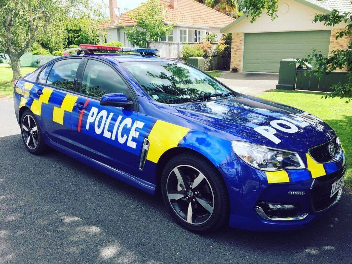 Boys and girls in blue getting blue highway patrol cars too Otago