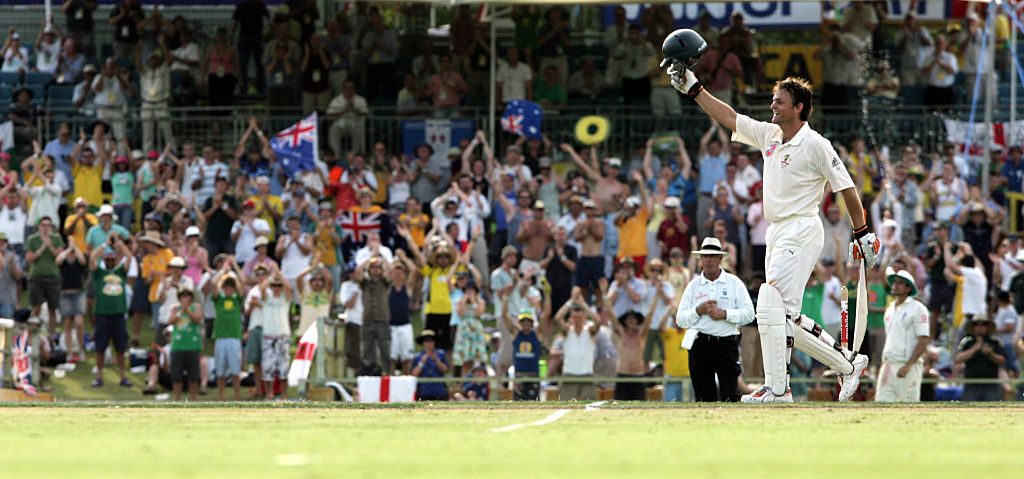 Australia's Adam Gilchrist celebrates his blistering hundred against England at the WACA in...