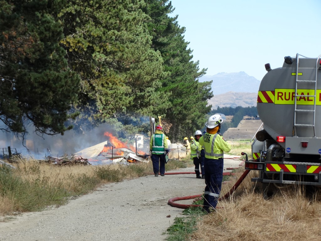 Firefighters at the scene earlier today. Photos: Kerrie Waterworth