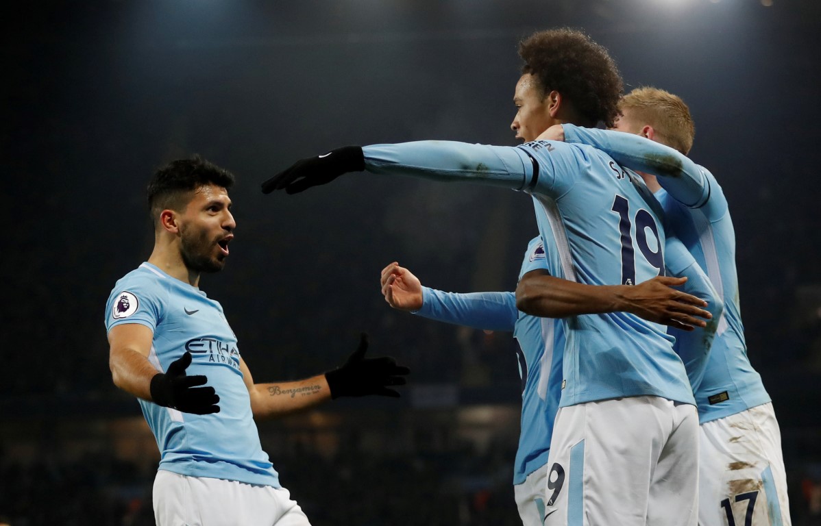 Sergio Aguero (L) celebrates his hat-trick against Newcastle United. Photo Reuters