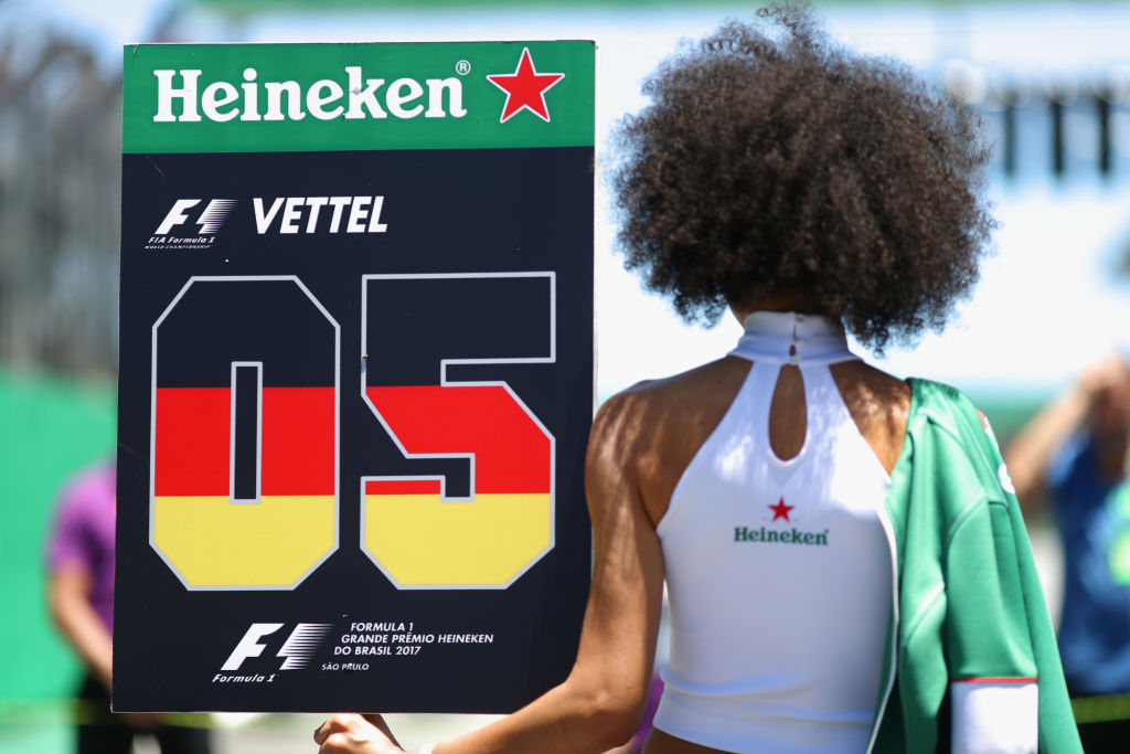 Sebastian Vettel's ''grid girl' stands on the grid before last year's Brazilian Grand Prix in Sao...