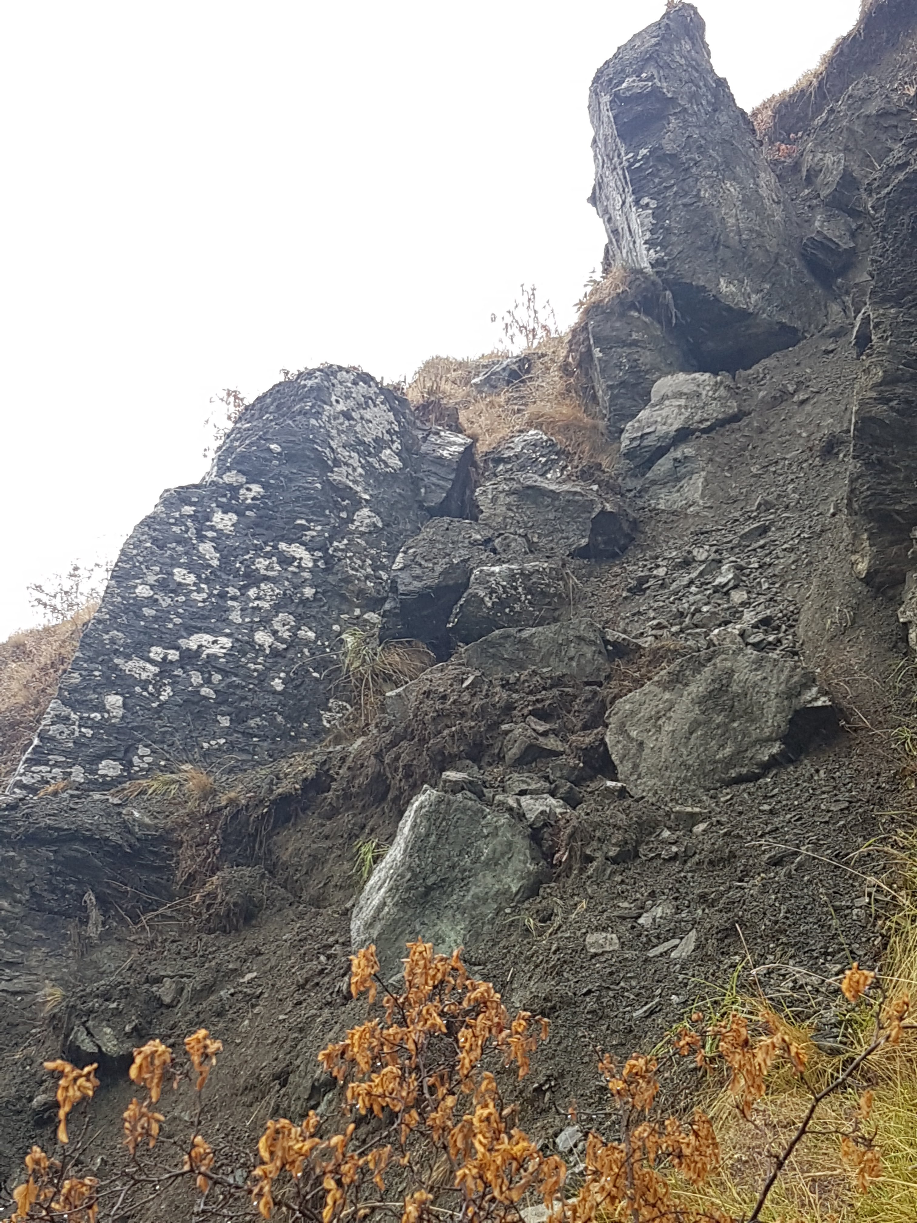 This car-sized boulder is perched precariously above the Crown Range road at the 8.5km mark on...