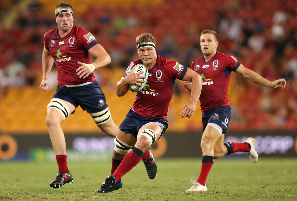 Adam Korczyk runs the ball up for the Reds against the Brumbies. Photo: Getty