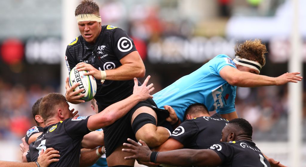 The Sharks' Stephan Lewies outjumps Ned Hanigan of the Waratahs to take the ball in a lineout....