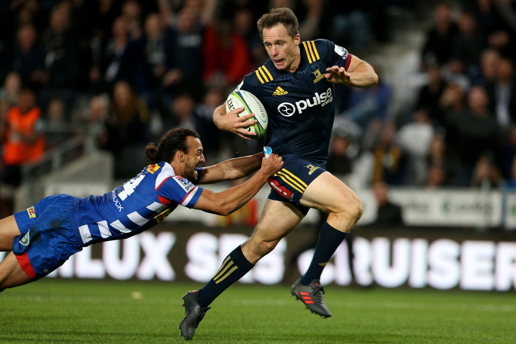 Highlanders fullback Ben Smith tries to get past Dillyn Leyds of the Stormers. Photo: Getty...