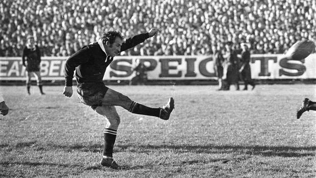 All Black fullback Fergie McCormick kicks a penalty in the first test against the Lions at...