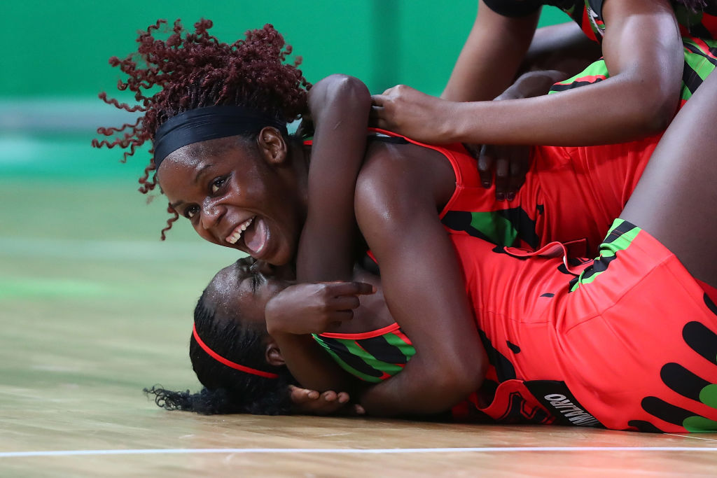 Malawi players celebrate their win over the Silver Ferns. Photo: Getty