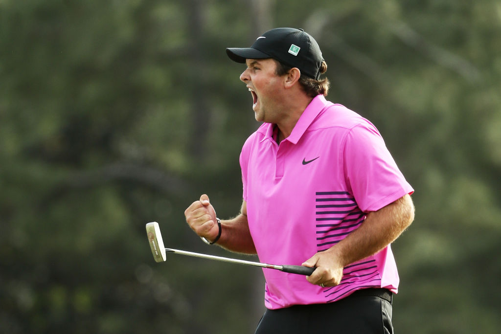 Patrick Reed celebrates making par on the 18th hole to win the 2018 Masters at Augusta National...