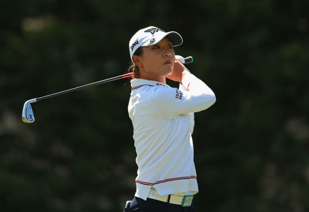 Lydia Ko watches her tee shot on the third hole during the final round. Photo Getty