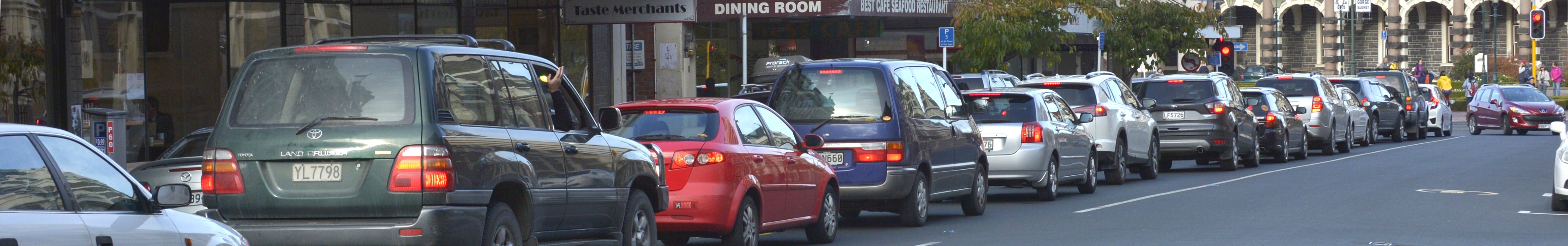 Frustrated motorists queue at a red light at the intersection of lower Stuart St and the one-way...