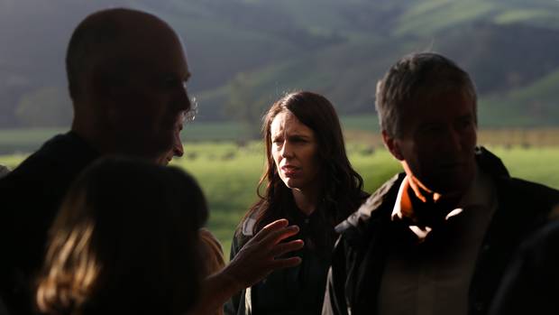 Prime Minister Jacinda Ardern meets farmers on a property near Te Awamutu this morning. Photo: NZ...