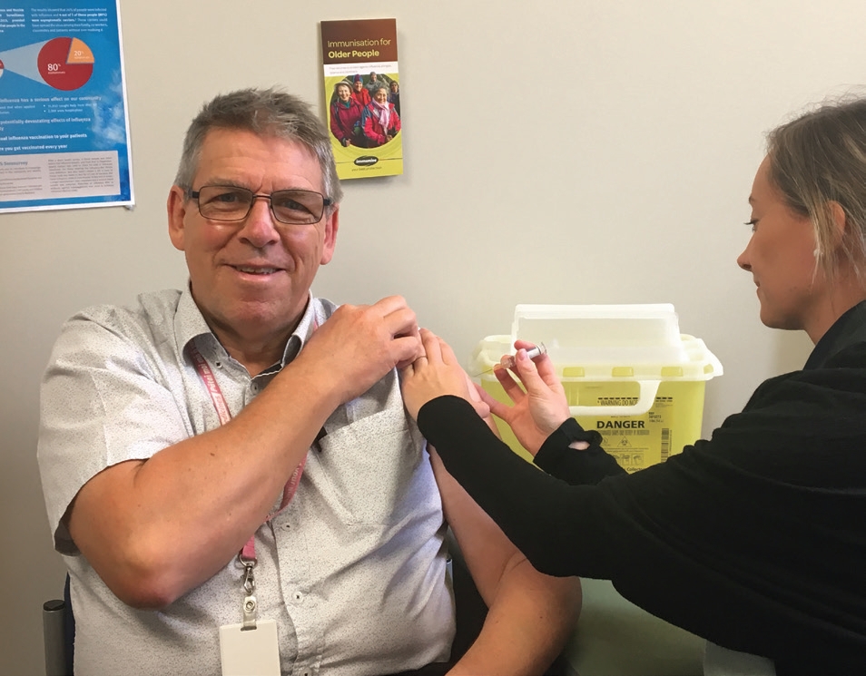 Chief Medical Officer, Dr Nigel Millar having his flu vaccination. Photo: Supplied.