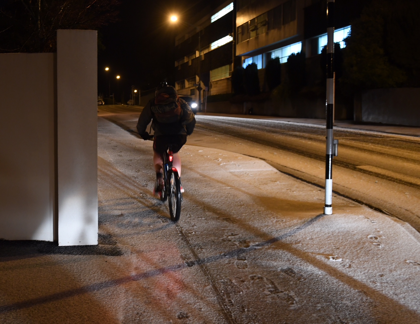 Cold? What cold? This hardy cyclist rides through a layer of hail on Highgate in Dunedin this...