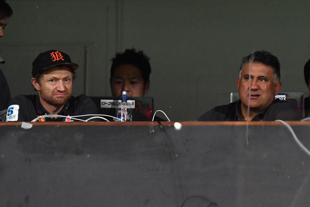 Coaches Tony Brown (L) and Jamie Joseph watch as the Sunwolves take on the Crusaders at AMI...
