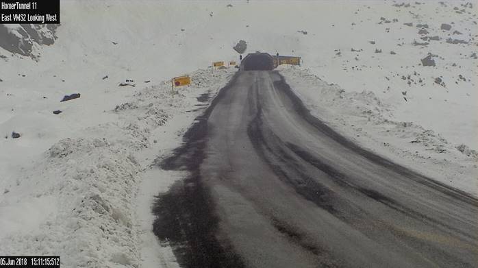 Milford Rd closed overnight from the Lower Hollyford Rd intersection with widespread snow...