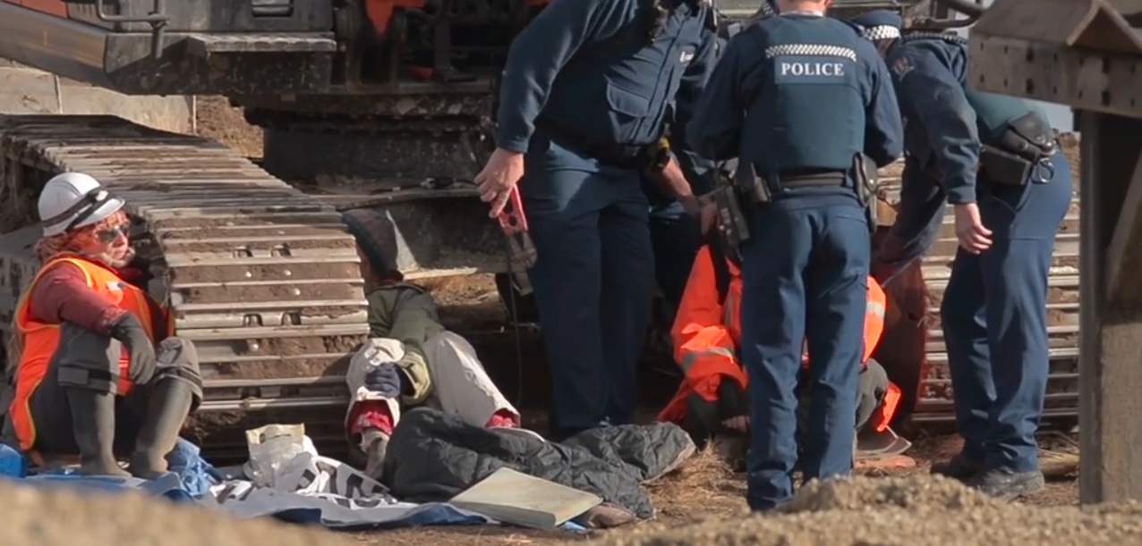The protesters were arrested on Monday.
