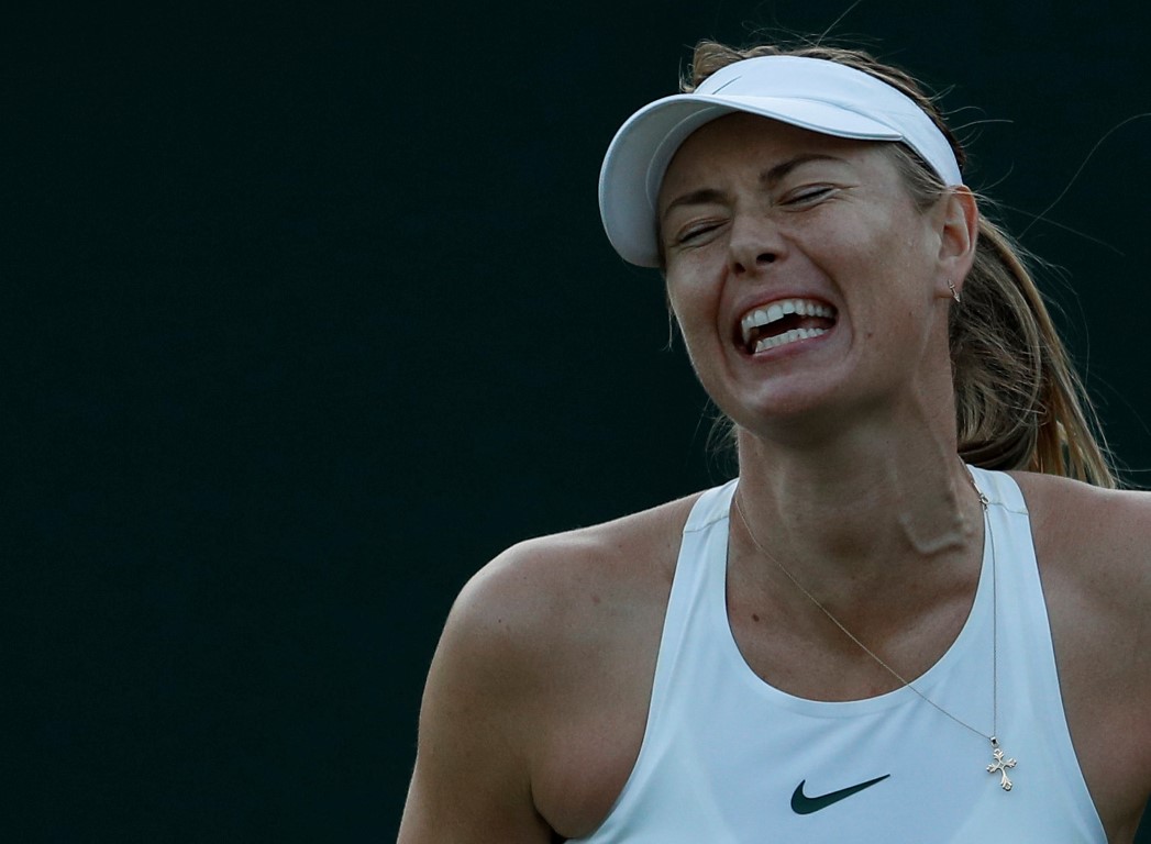 Maria Sharapova feels the pain during her match with Vitalia Diatchenko. Photos: Reuters