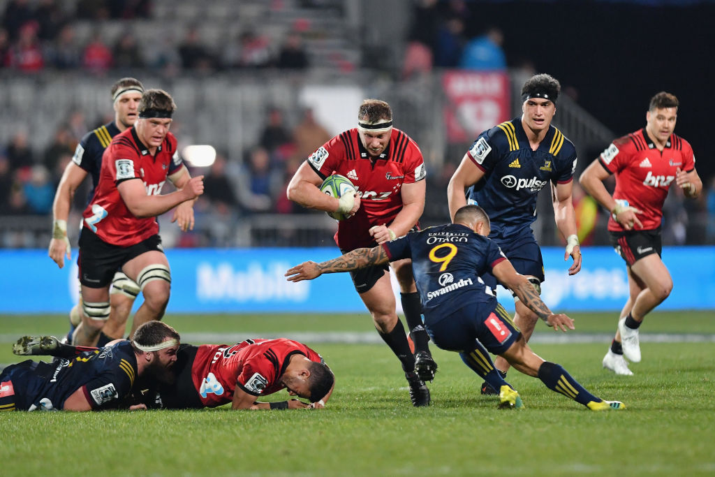 Wyatt Crockett on the charge for the Crusaders in his 200th game for the team. Photo Getty Images
