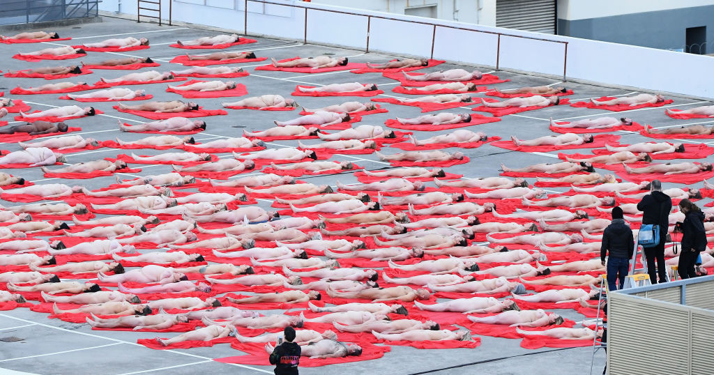 Participants pose for Spencer Tunick's photo shoot in Melbourne on Monday morning. Photo: Getty