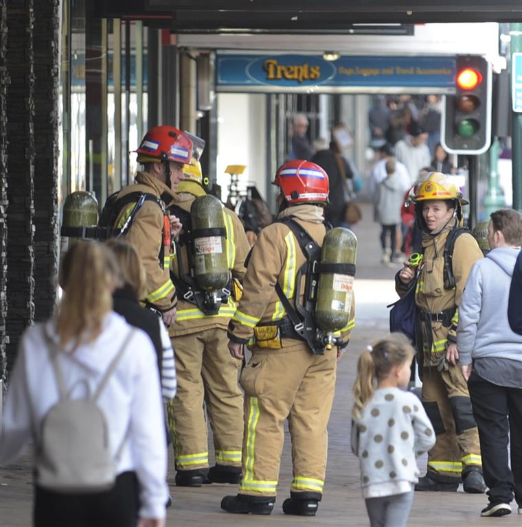 Firefighters at the scene of a reported gas leak in George St this morning. Photo: Gerard O'Brien