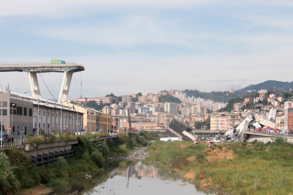 The remains of the Morandi motorway bridge stand after it partially collapsed in Genoa. Photo: Getty