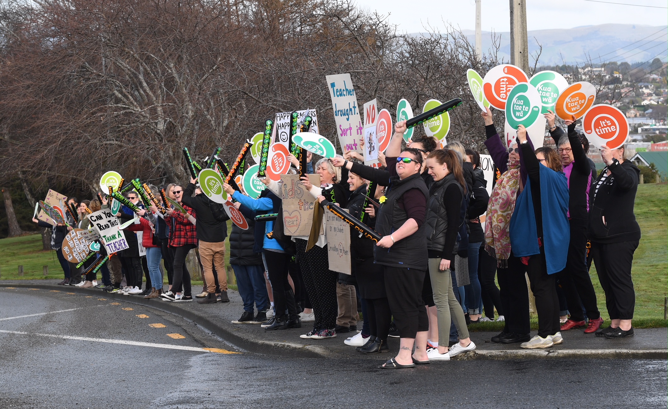 Striking South Otago NZEI members interact with SH1 motorists at Balclutha. Photo: Stephen Jaquiery 