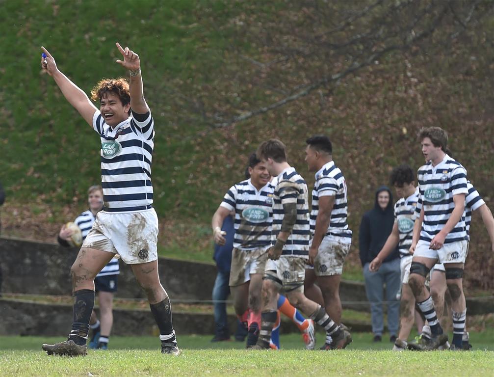 Otago Boys' High players celebrate their victory over Southland Boys'. Photo: Peter McIntosh 