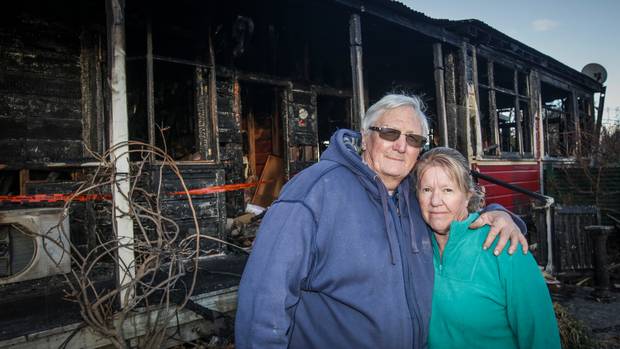 Bruce Buchanan and Jocelyn Buchanan, at their property destroyed by fire in Waipawa. Photo: NZME