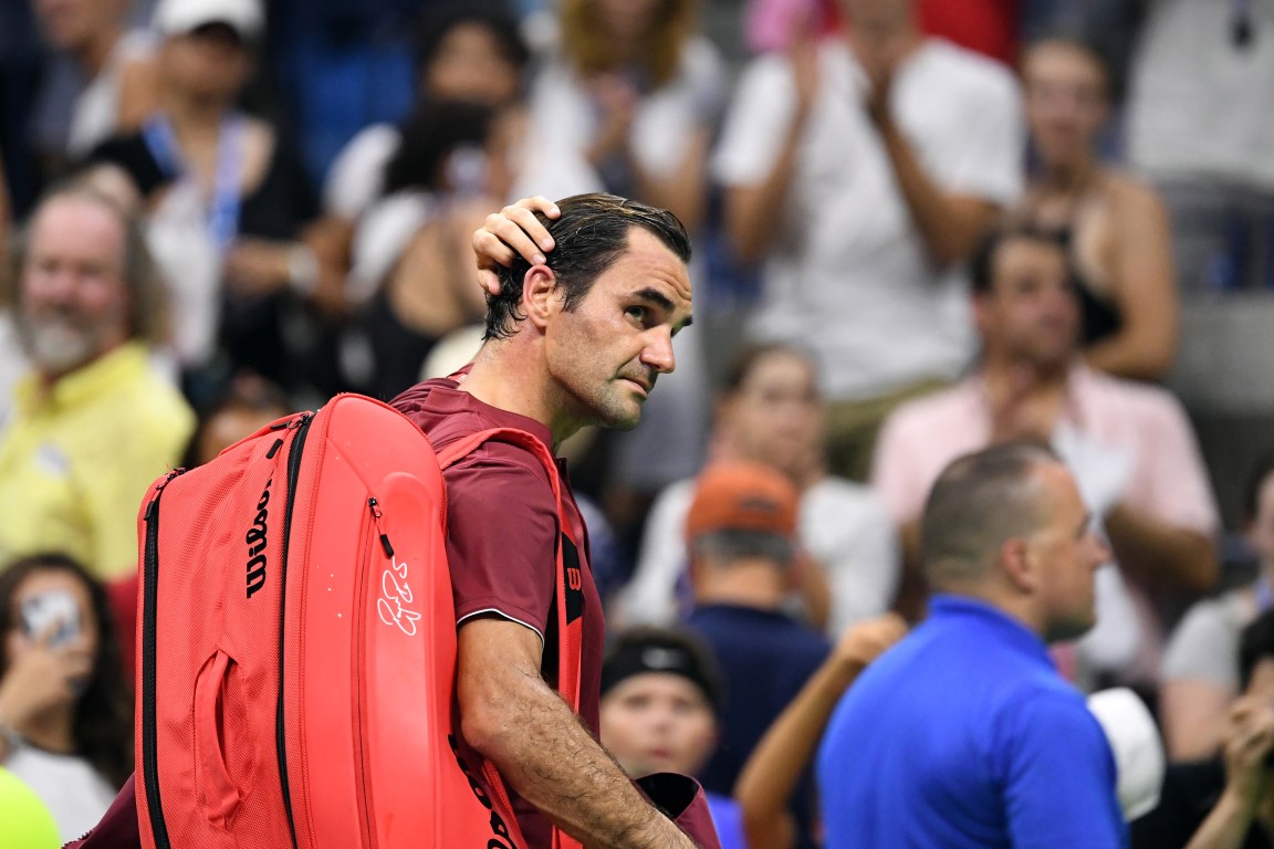 Roger Federer leaves the court after his loss to John Millman. Photo: Danielle Parhizkaran-USA...